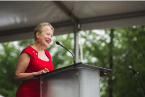 Teri Popp speaking at the Military Family Tribute Dedication in 2011